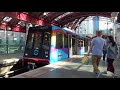 DLR B92 Stock 64, 89 and 61 departing Canary Wharf