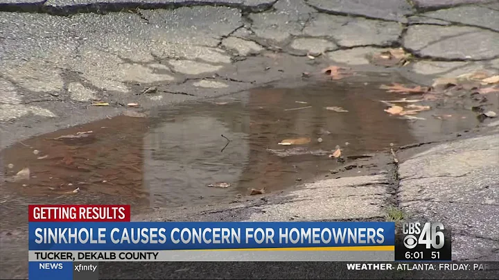 Crews repair sinkhole in townhome community