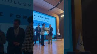 İl Birim Sorumlusu Sn Kezban Kar Topalın Prof Dr Ahmet Akına Çiçek Takdimi. İlkokul Ortaokul Lise