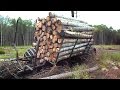 Timberjack 810B logging in wet forest, difficult conditions