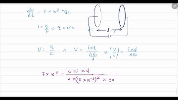 A parallel plate capacitor consisting of two circular plates of radius 10 cm is being charged by a 