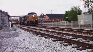 Historic Martinsburg Roundhouse watches CSX I136-13 passes bye