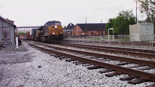 Historic Martinsburg Roundhouse watches CSX I136-13 passes bye
