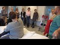 Sliding the patient to and fro the operating table - using the best red sliding spinnaker cloth.