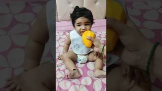 Cute baby eating mango..#cute  #mango  #shortvideo  #viral Resimi