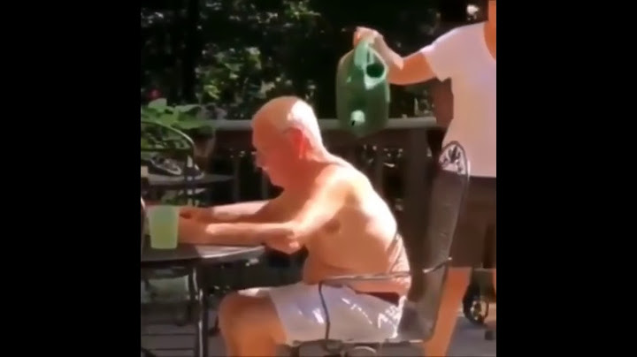 MAN GETS WATER POURED ON BACK AND HIS HEAD EXPANDS