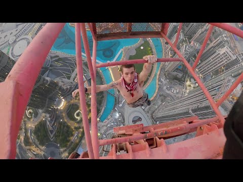 Hanging off the tallest crane in Dubai (390m) AFTER getting caught...