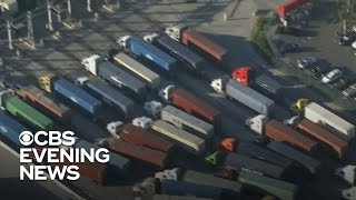 Truck driver shortage fuels supply chain gridlock