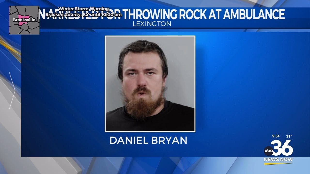 Man arrested for throwing rock at ambulance - YouTube