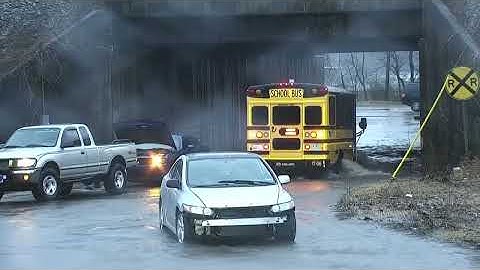 School bus drives through Jefferson County floodwaters