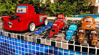 Disney Pixar Cars falling into deep pool, Lightning McQueen, Tow Mater, Mack, Sally, Francesco