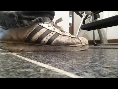 Crushing cockroach with Adidas superstars