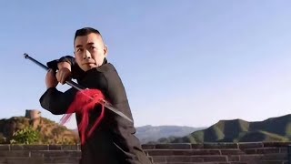Fung fu star Zhao Wenzhuo kicking sword  on the Great Wall