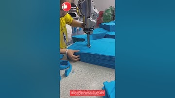 One Slice, Many Layers! ✂️ This high-speed fabric cutting machine cuts through bundled fabric in a s