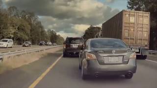 Driver Weaves In and Out of Traffic Asking for an Accident - Teslacam
