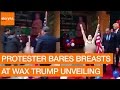 Protester Bares Breasts at Wax Trump Unveiling