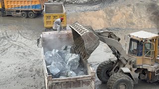 CAT 966E Wheel Loader Working at Construction Site