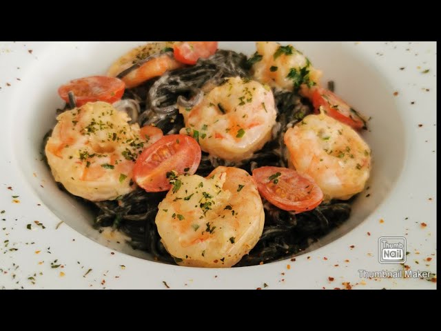 Spaghettis à l'encre de seiche, seiches et épices - Recette Ptitchef