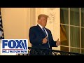 Trump waves from White House upon returning from Walter Reed