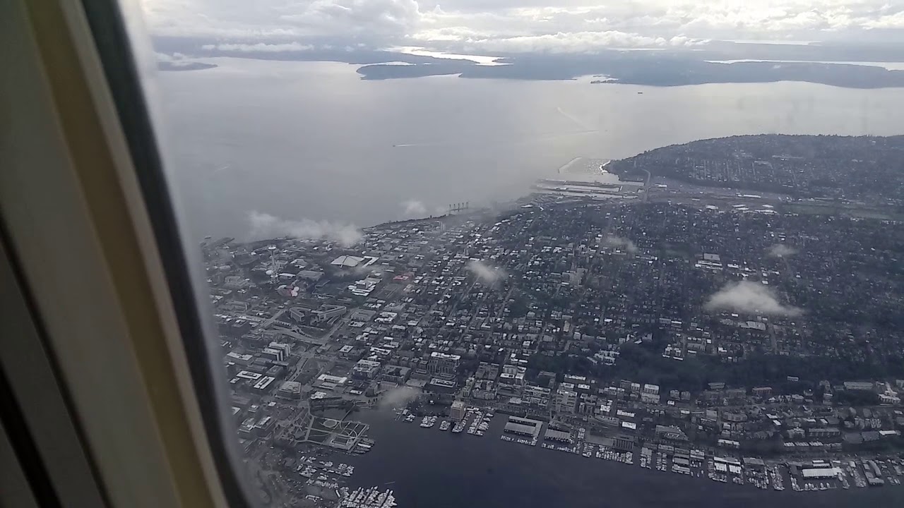 Epic Descent into Seattle: Aerial View of Space Needle