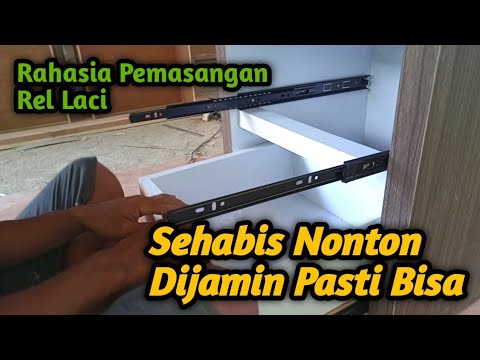 Video: Rel pemasangan: membaiki kabinet dinding