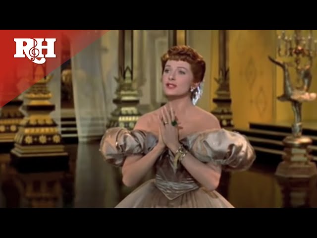 Yul Brynner and Deborah Kerr perform Shall We Dance from The King and I class=