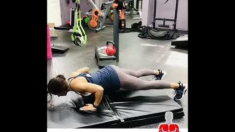 How to do a Push-up to Alternating Toe Touch Variation