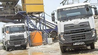 UD Trucks Quester Ready Mix Excavator Dump Truck Working On Dam