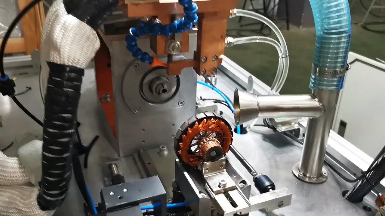 Armature commutator spot welding machine for universal motor armature