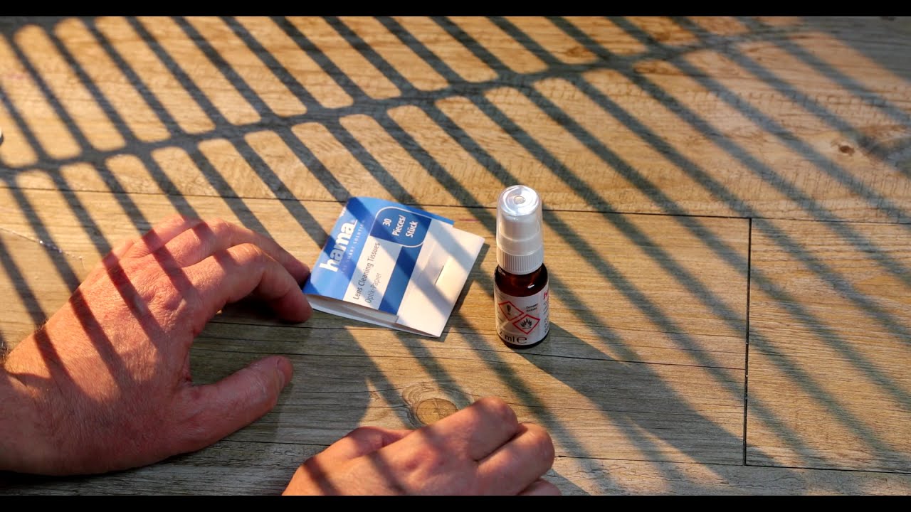 Lens cleaner and lens cleaning tissues