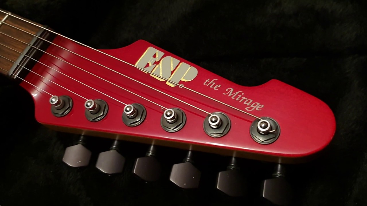Esp Custom Guitars: The Mirage Deluxe Red Ash Wilkinson Tremolo Up