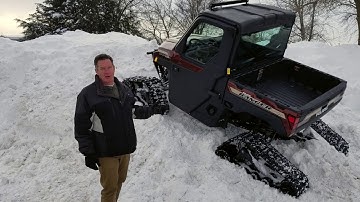 POLARIS RANGER 1000 WITH TRACKS ON SNOW MOUNTAIN