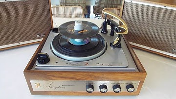 Magnavox Micromatic record player system playing a stack of 45