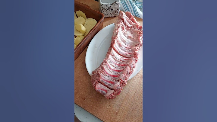 COSTILLAS AL HORNO CON PATATAS