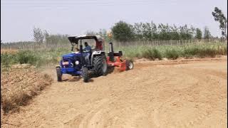 Marshal Laser land leveler and Farmtrac Tactor