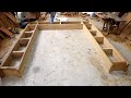 Incredibly large woodworking projectbuilding the frame of the big door with ultra modern solid wood