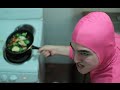 PINK GUY COOKS STIR FRY AND RAPS