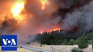 An explosive wildfire that closed down dozens of miles a major
california freeway nearly tripled in size overnight, just weeks after
nearby blaze l...