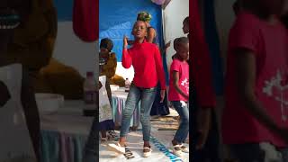 African kid at party dancing For You by Hanson Baliruno