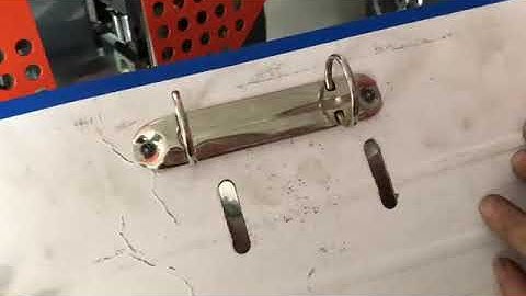 Lever arch file making machine-riveting machine clips