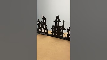 Make a street of light up Haunted Houses from Dollar Tree silhouettes