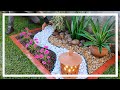 Elegante jardim com flores e pedras naturais / Ideias para jardim