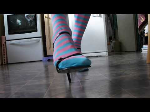 Black Heels Pink and Blue  Striped Stockings.