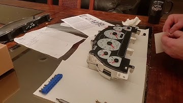 03-04 cobra gauge cluster overlay and bezel install.