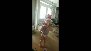 Girl gets herself stuck in toy basket