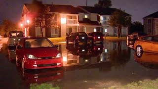 Floodwater strands residents in parking lot in Riverview, Mich.