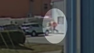 Neighboring business captures workers fleeing shooter on security camera