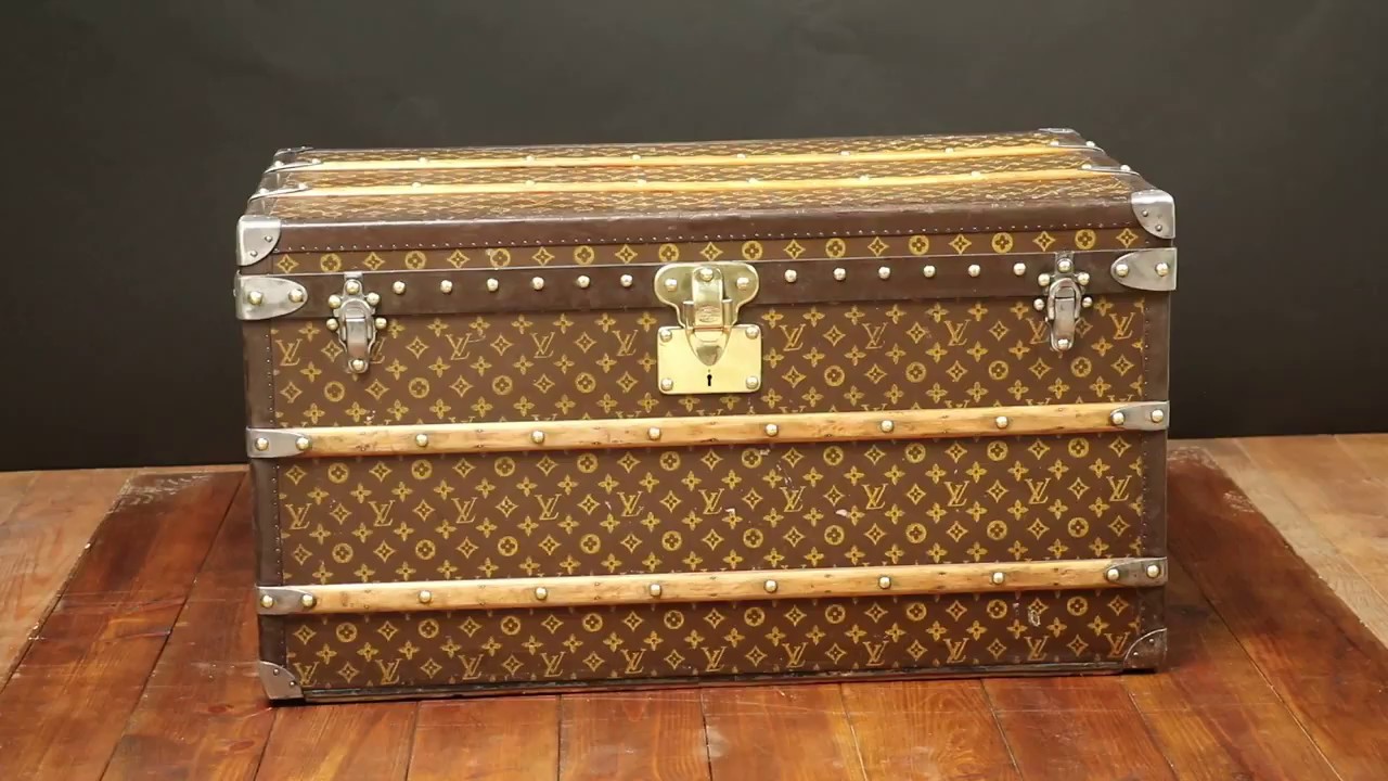 This Louis Vuitton cabin trunk with stenciled monogrammed canvas is ideal  for a coffee table