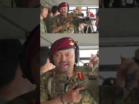 Brunei's Crown Prince visits SAFTI City, tries out drones, rifles