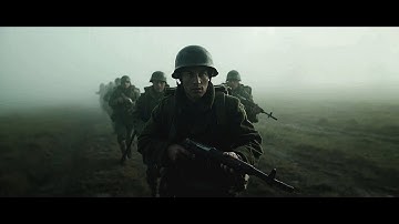Group of soldiers in military uniform, walking in a foggy, field-like landscape.